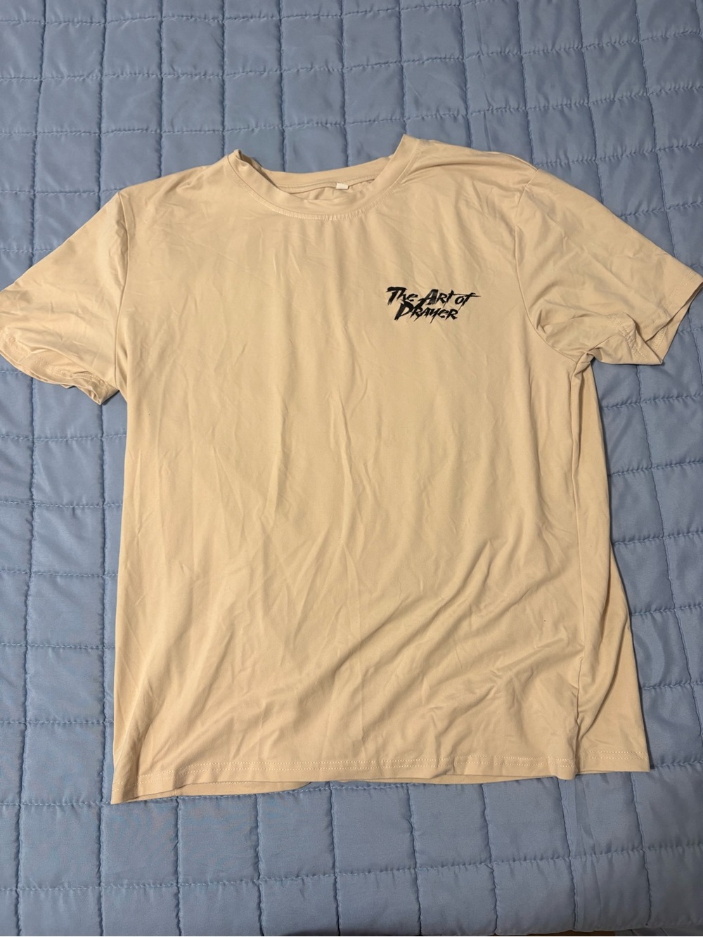 Source Unknown Cream Short Sleeve Tee with Black Chest Graphic